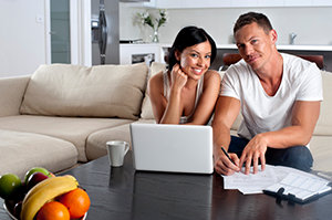 Couple looking at bills